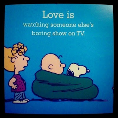 Love is watching some else’s boring show on TV